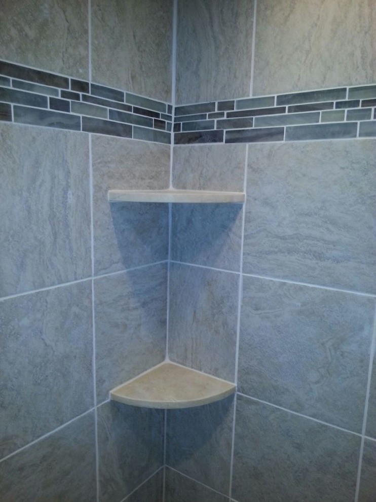 Inspiration for a small traditional master bathroom in Philadelphia with an alcove shower, gray tile, ceramic tile and ceramic floors.