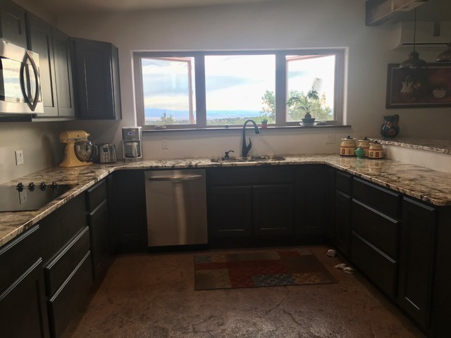Example of a transitional kitchen design in Denver