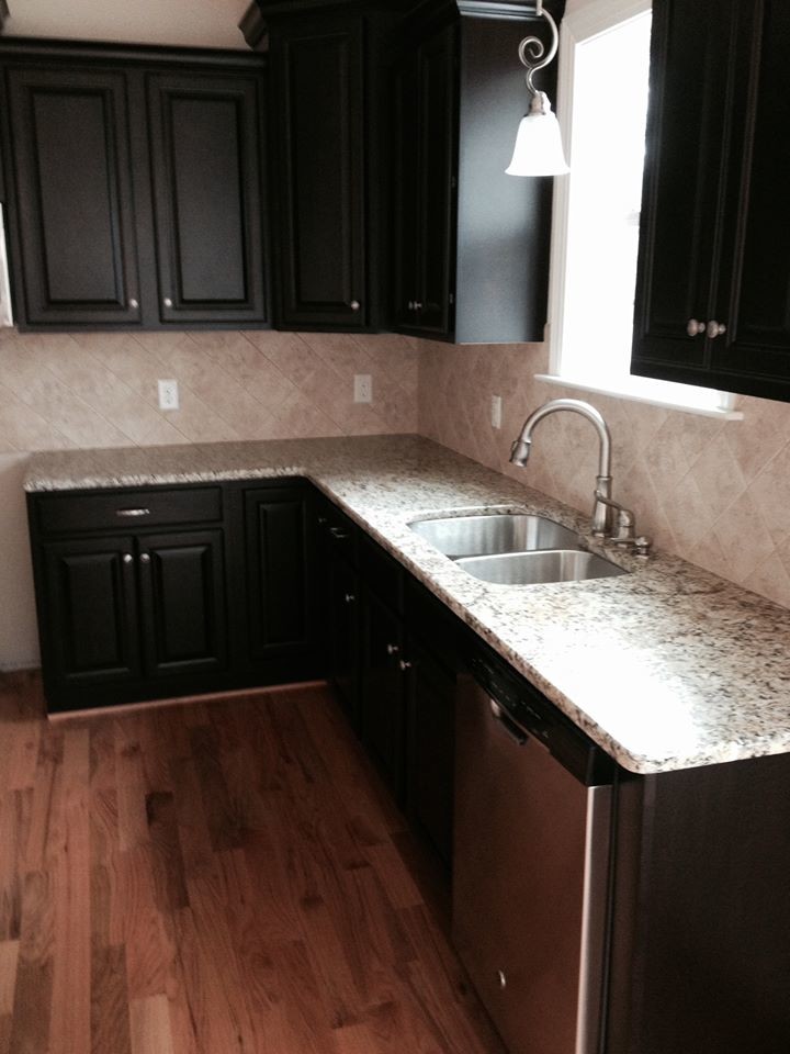 Transitional kitchen photo in Raleigh with granite countertops, multicolored backsplash and ceramic backsplash