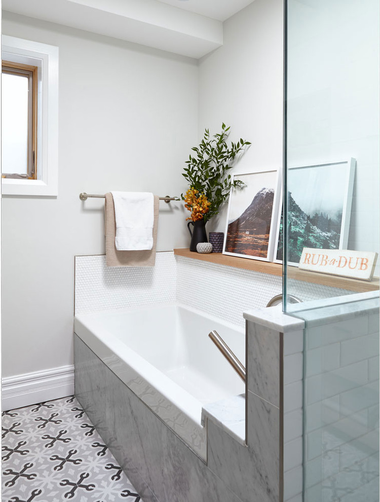 Inspiration for a contemporary master bathroom in Toronto with flat-panel cabinets and solid surface benchtops.