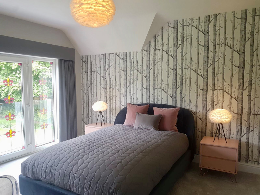 Large scandinavian guest bedroom in Hertfordshire with grey walls, carpet and grey floor.