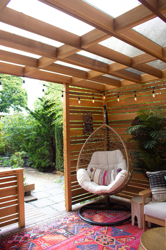 Inspiration for a small asian backyard shaded garden for summer in Portland with with privacy feature and decking.