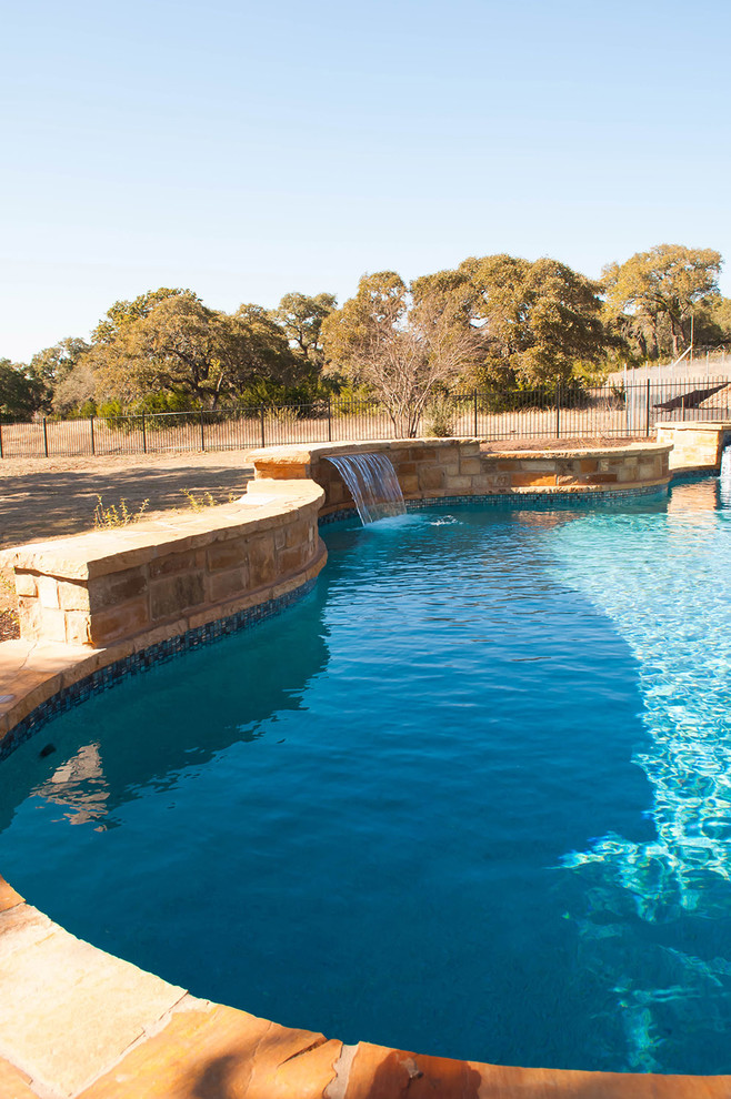 Mountain style pool photo in Austin