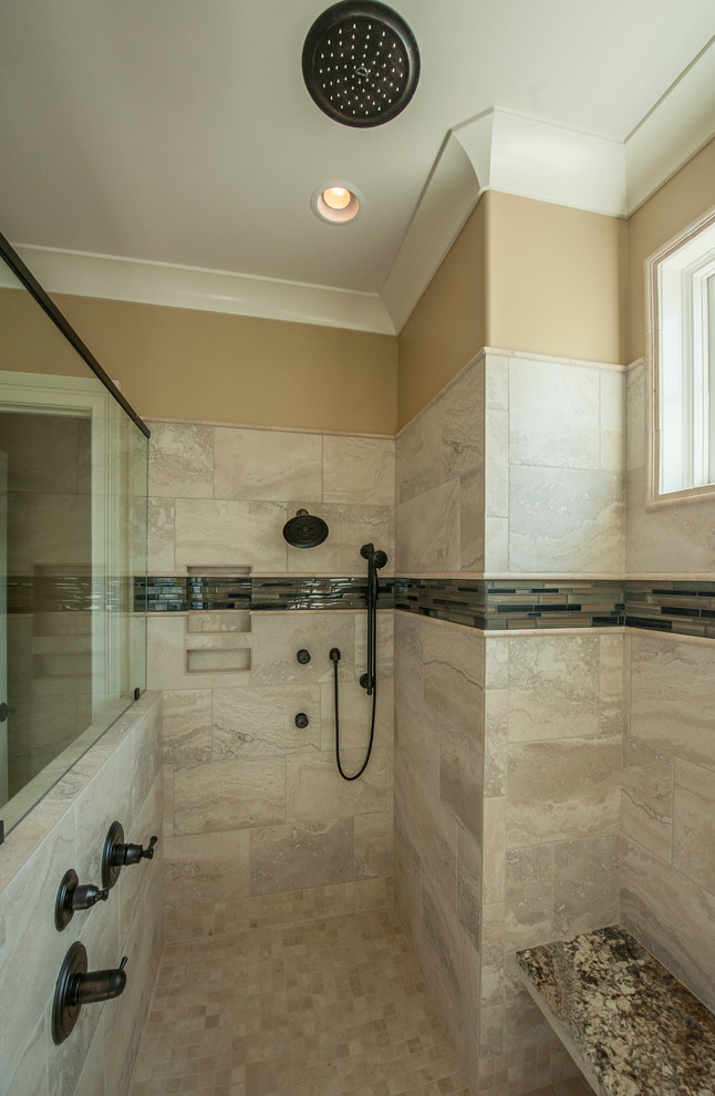 Inspiration for a large country master bathroom in Other with raised-panel cabinets, a drop-in tub, beige tile, ceramic tile, ceramic floors, an undermount sink, granite benchtops, dark wood cabinets, an alcove shower, a two-piece toilet and beige walls.