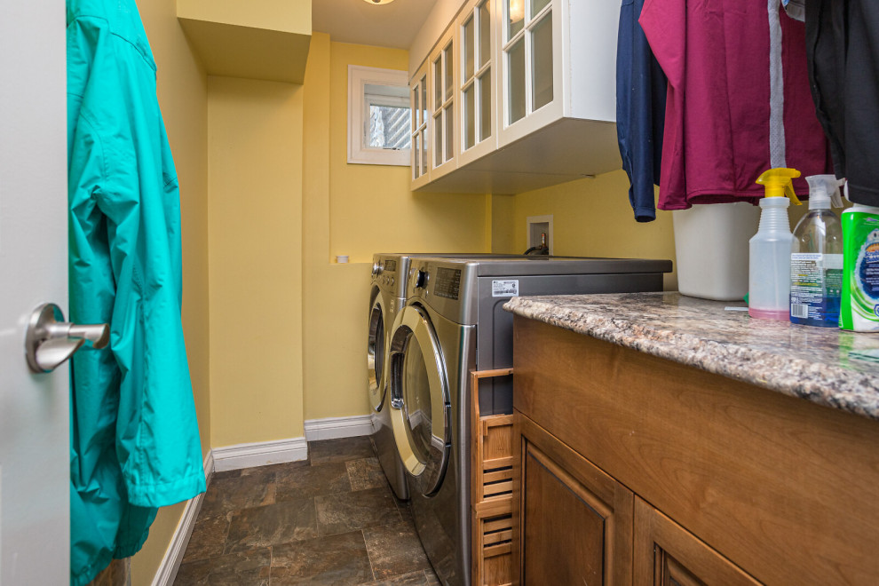 Large traditional laundry room in Other.