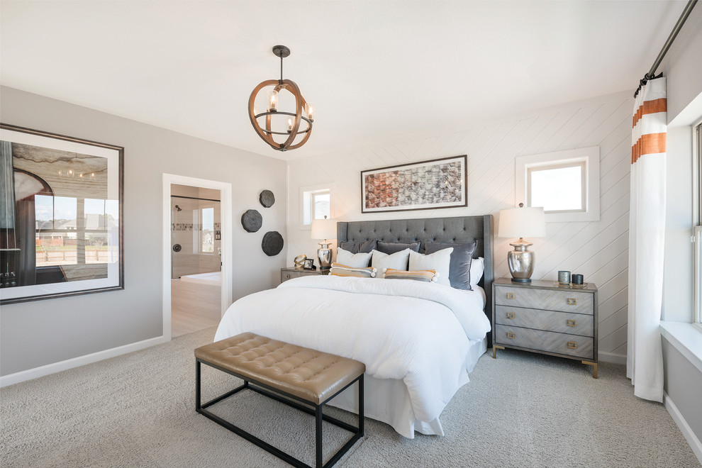 Design ideas for a transitional master bedroom in Houston with white walls, carpet and grey floor.