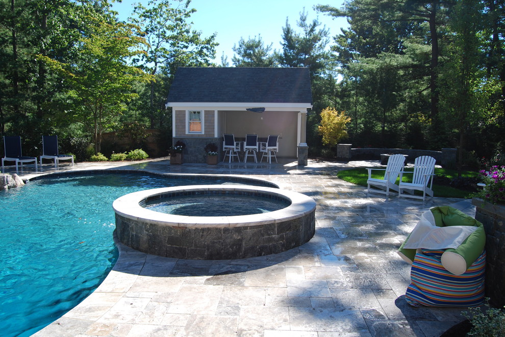 Mid-sized mountain style backyard stone and kidney-shaped natural water slide photo in Boston