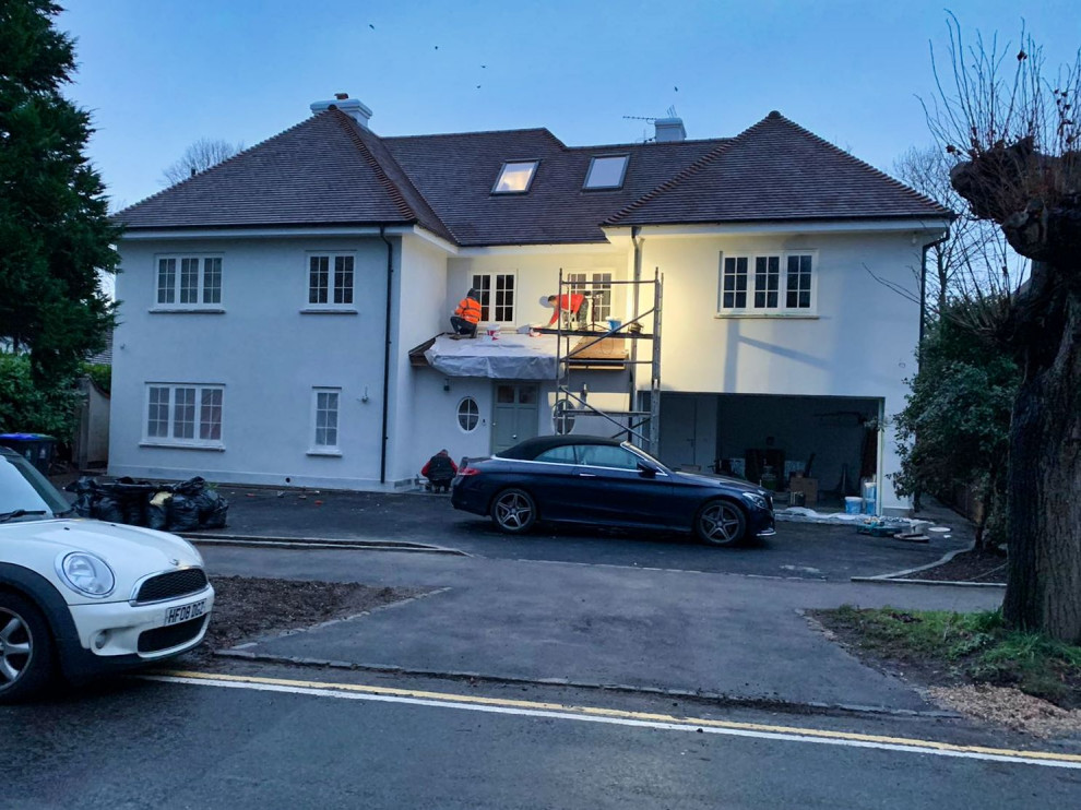 Double storey side and single rear extensions, full roof reconfiguration
