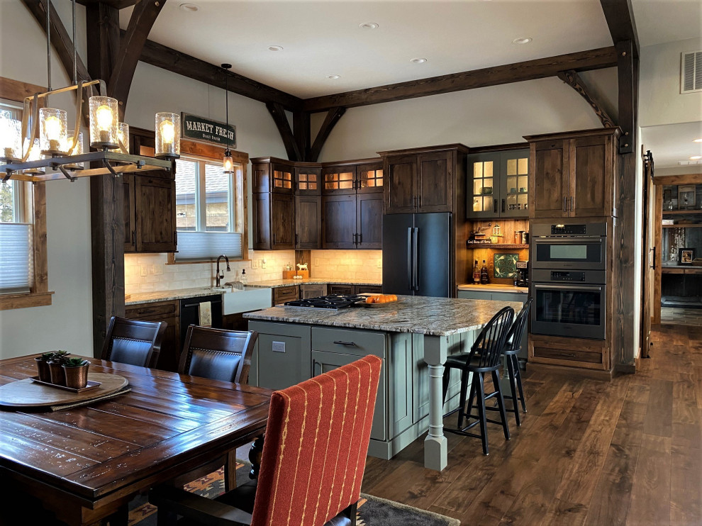 Example of a mountain style home design design in Denver
