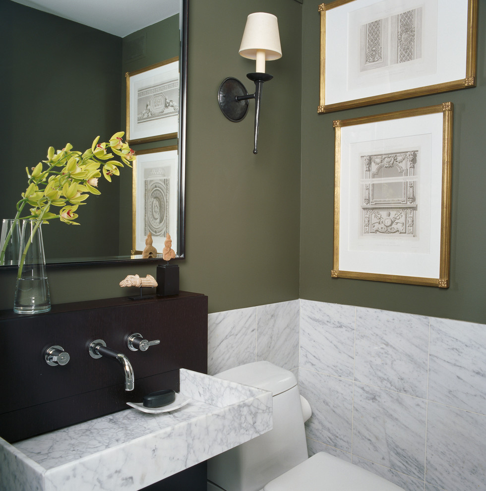 Inspiration for a contemporary powder room in Chicago with a wall-mount sink, green walls and marble.