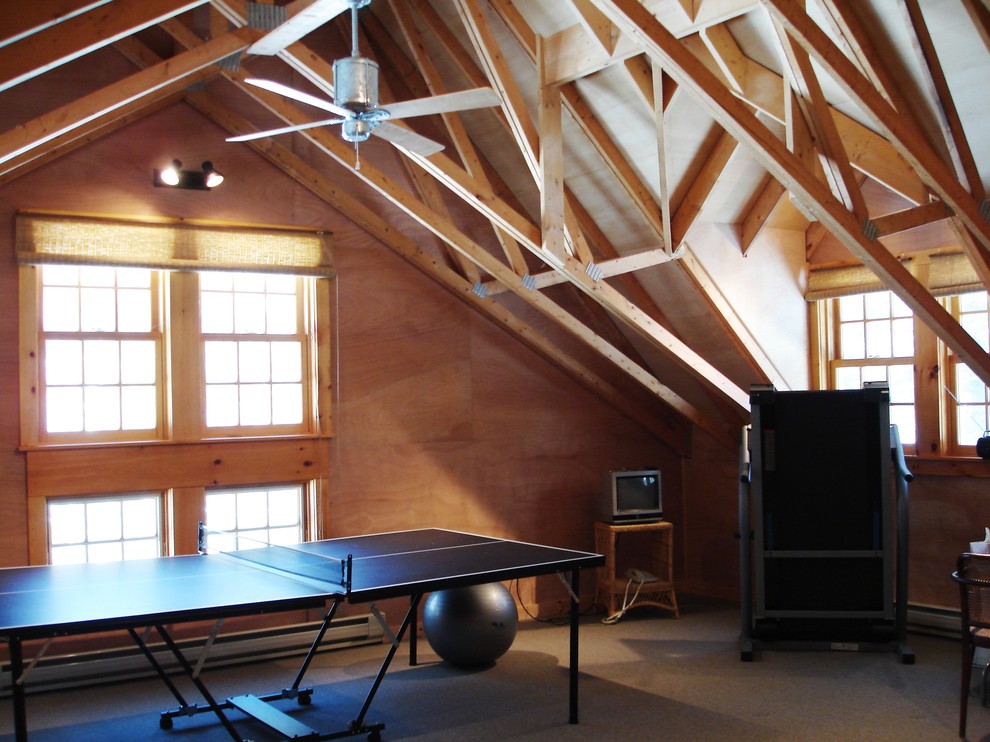 This is an example of a country family room in New York with a game room.