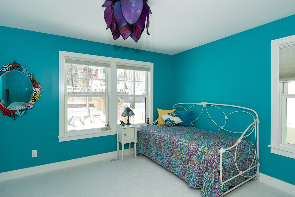 Inspiration for an arts and crafts bedroom in Minneapolis with blue walls, carpet and no fireplace.