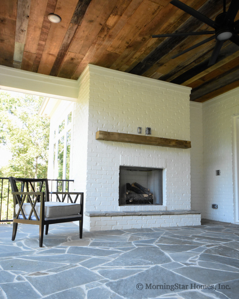 This is an example of a transitional patio in Raleigh.