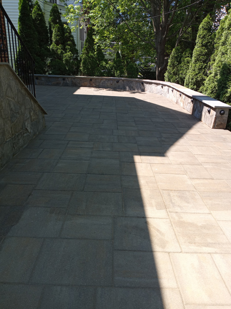 Paver Patio and  sitting stone wall with lights