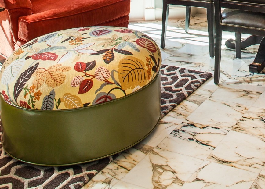 Inspiration for a large transitional u-shaped marble floor eat-in kitchen remodel in Houston with a drop-in sink, recessed-panel cabinets, white cabinets, granite countertops, brown backsplash, stone tile backsplash, black appliances and an island