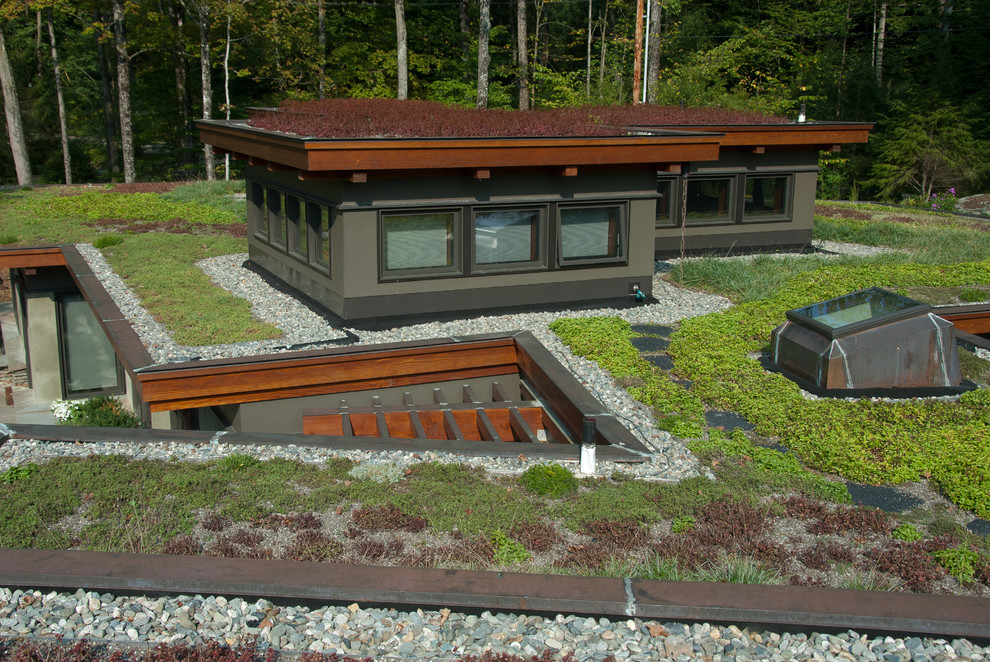 Design ideas for a modern exterior in Burlington with a flat roof.