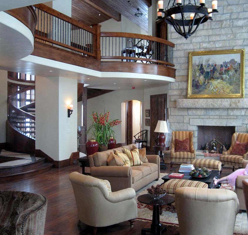 Expansive traditional living room in Salt Lake City with dark hardwood floors.