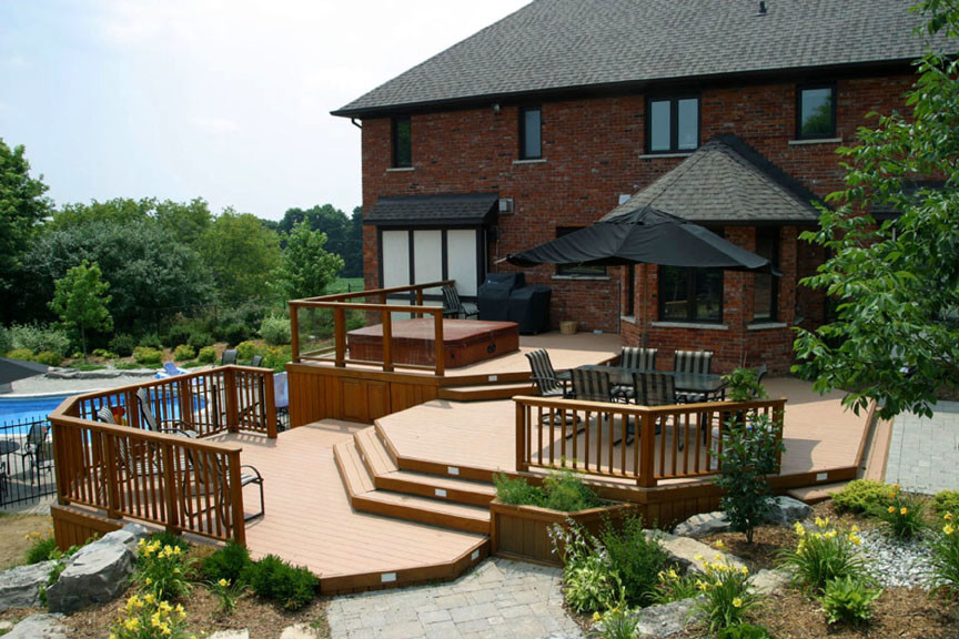 Deck - mid-sized modern backyard deck idea in Toronto