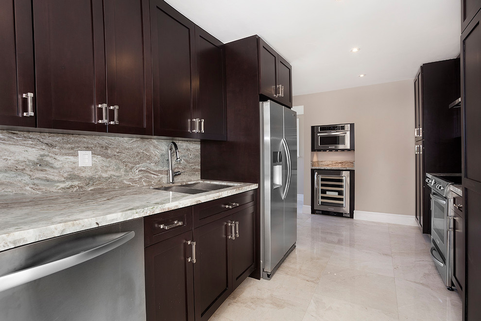 Example of a transitional kitchen design in Miami