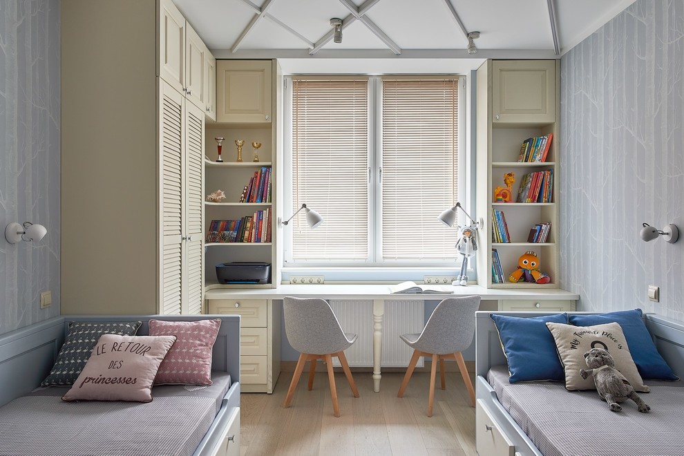 This is an example of a scandinavian gender-neutral kids' study room in Other with beige floor, grey walls and light hardwood floors.