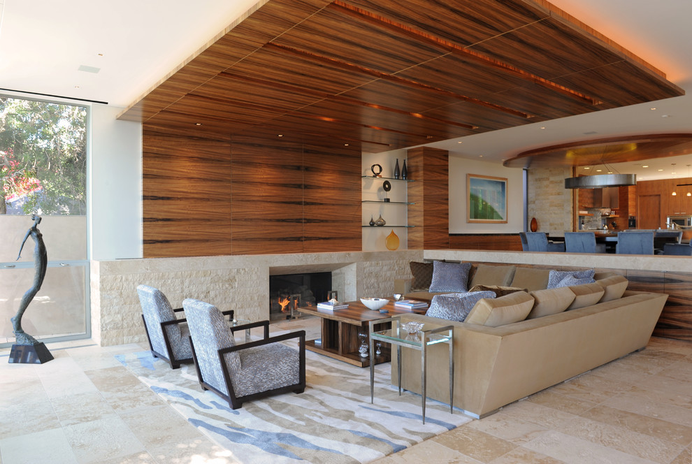 Inspiration for a beach style living room in Los Angeles with a standard fireplace and no tv.