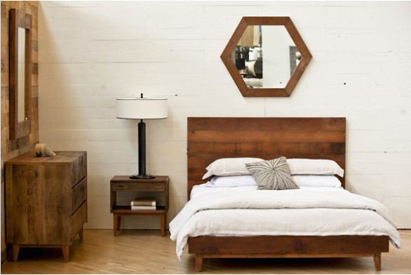 Mid-sized mountain style guest light wood floor and brown floor bedroom photo in Orange County with white walls and no fireplace