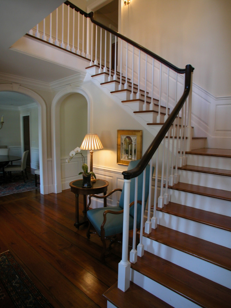 Inspiration for a mid-sized traditional wood l-shaped staircase in Atlanta with wood risers.