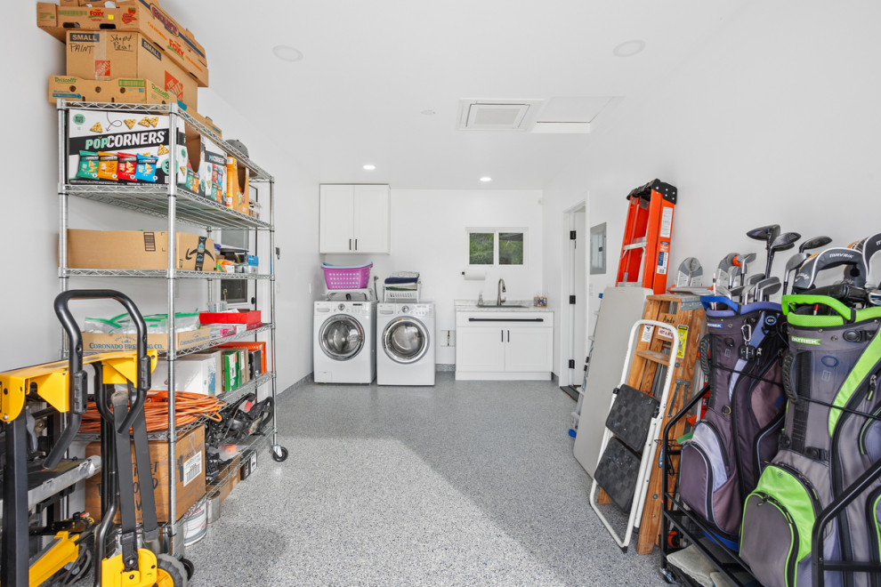 Photo of a mid-sized traditional one-car garage in San Diego.