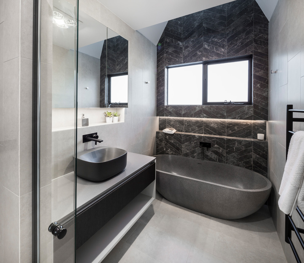 Photo of a mid-sized contemporary 3/4 bathroom in Canberra - Queanbeyan with a corner shower and grey floor.