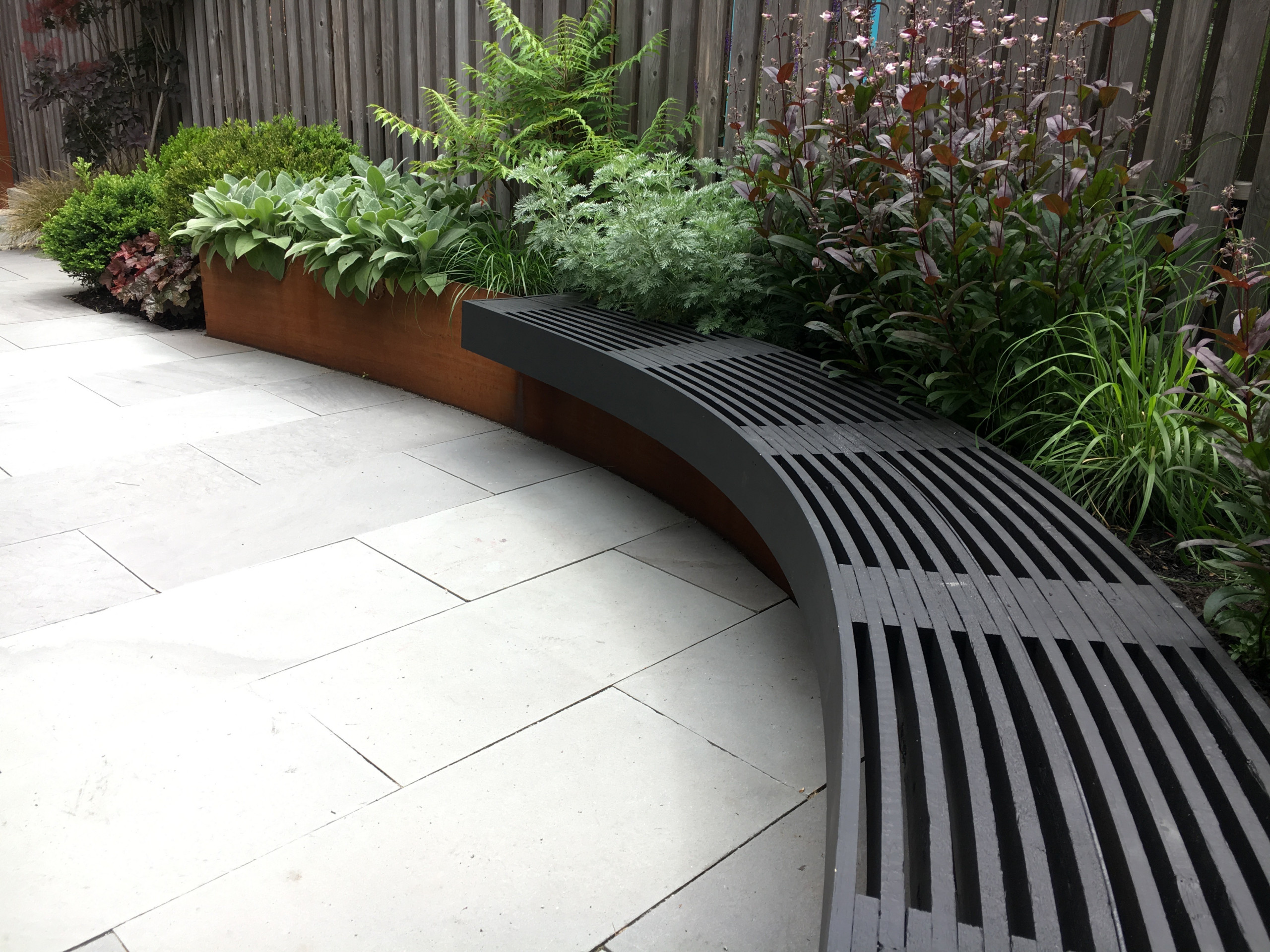 Modern Garden with Curved Corten Border