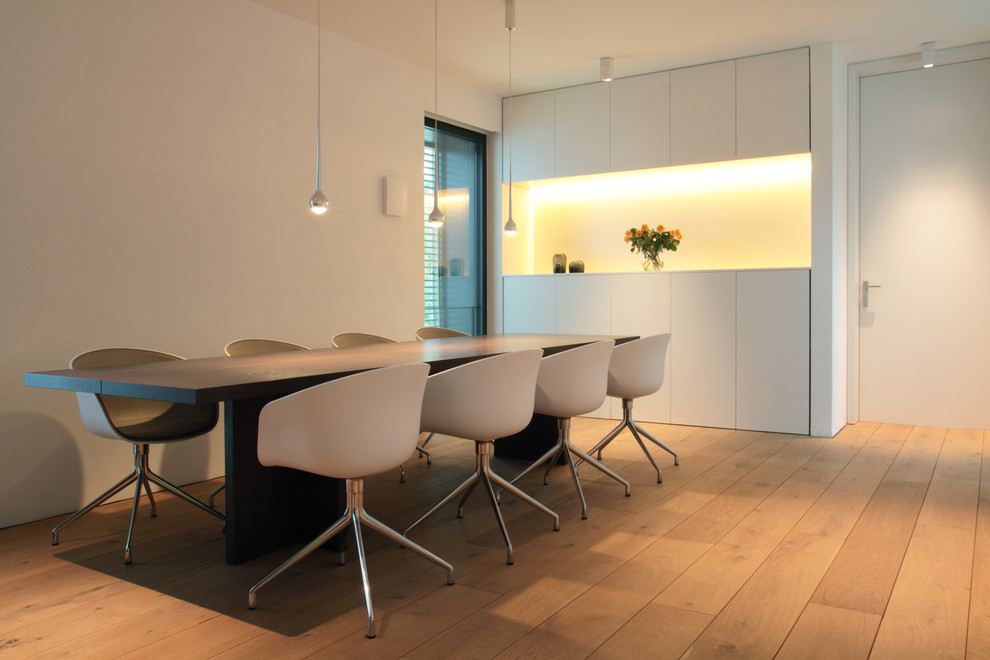 Design ideas for an expansive modern dining room in Hanover.