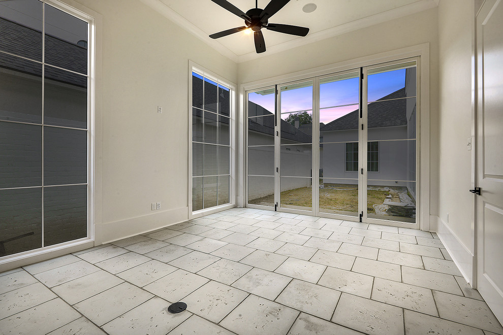 Mid-sized transitional sunroom in New Orleans with concrete floors, no fireplace, a standard ceiling and grey floor.
