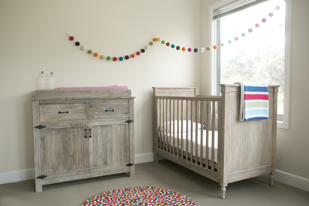 Design ideas for a traditional nursery in Melbourne with beige walls.