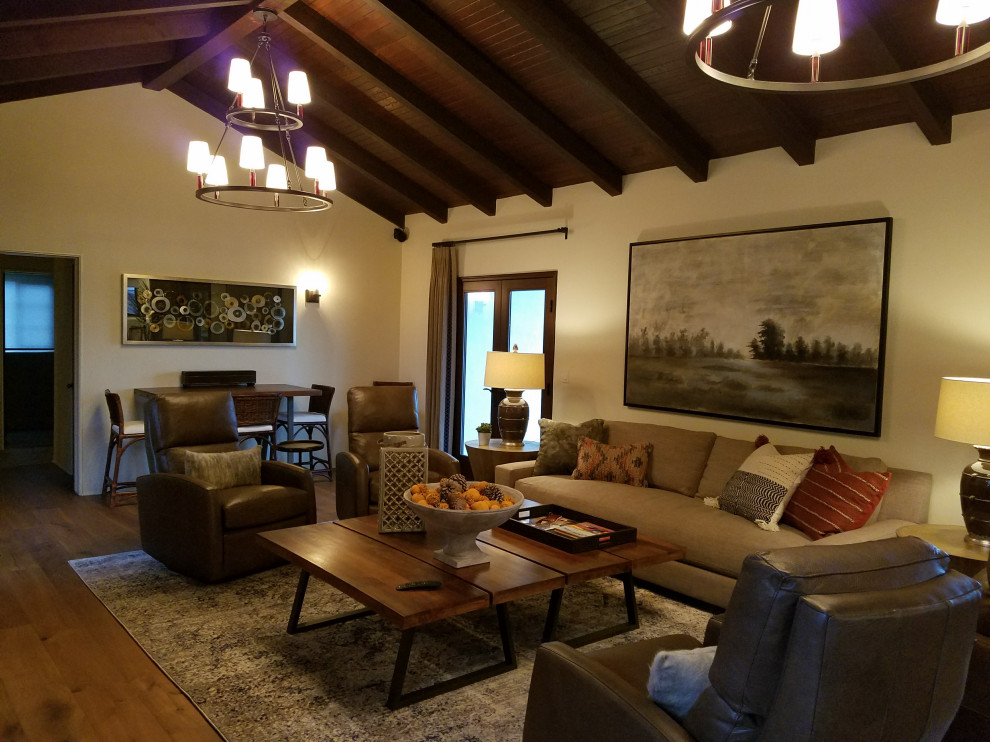 Inspiration for a large country open concept living room in San Luis Obispo with white walls, no fireplace, no tv and light hardwood floors.
