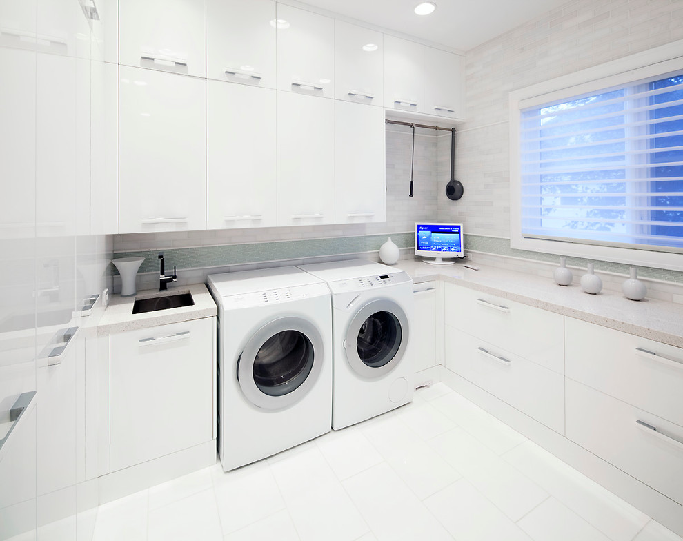Inspiration for a contemporary laundry room in Calgary.