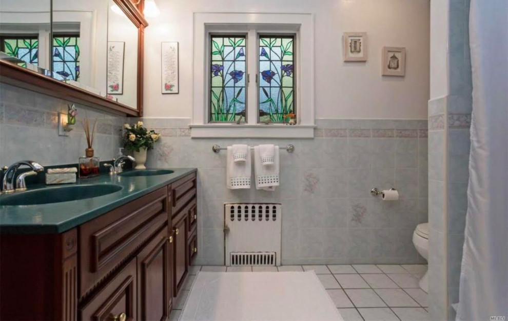 Design ideas for a large eclectic master bathroom in New York with medium wood cabinets, an alcove tub, an alcove shower, grey walls, cement tiles, engineered quartz benchtops, turquoise floor, white benchtops, a double vanity and a freestanding vanity.