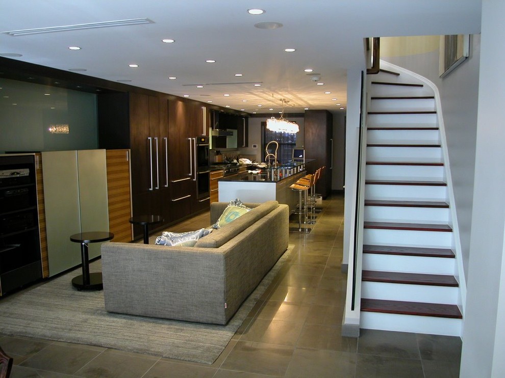 Contemporary basement in New York with grey walls, ceramic floors and grey floor.