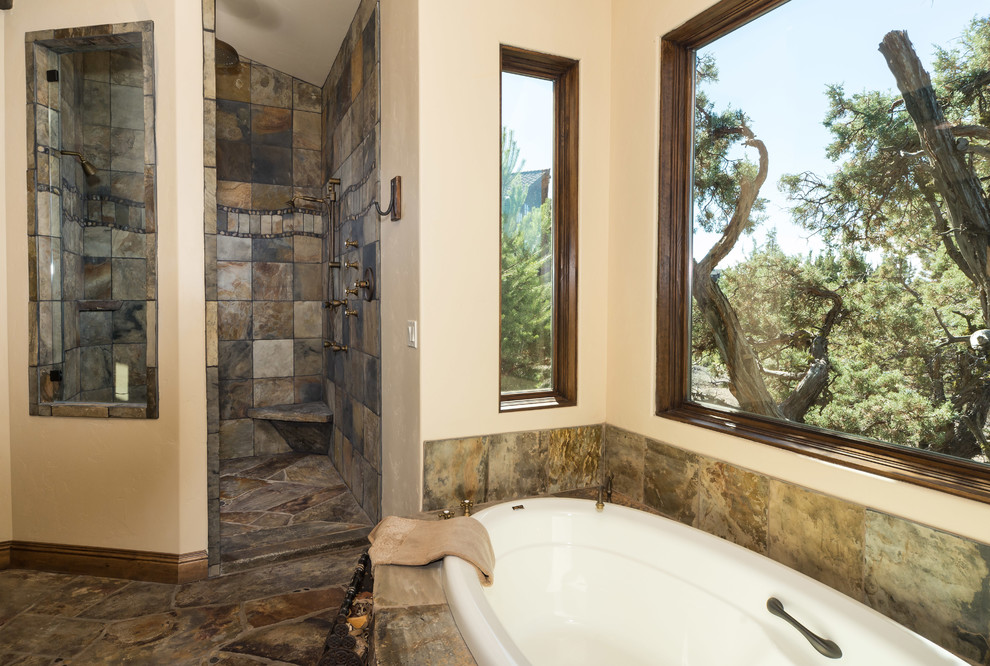 Water tower inspired home master bath suite view of shower Rustic