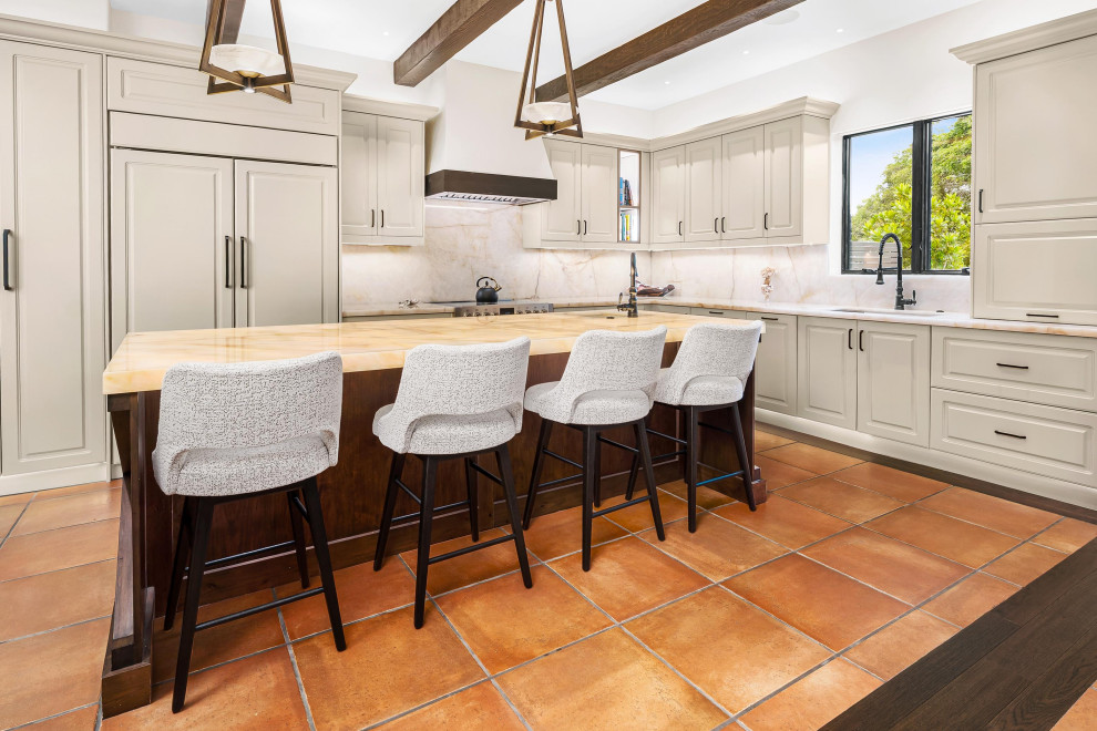 Example of a transitional kitchen design in Miami