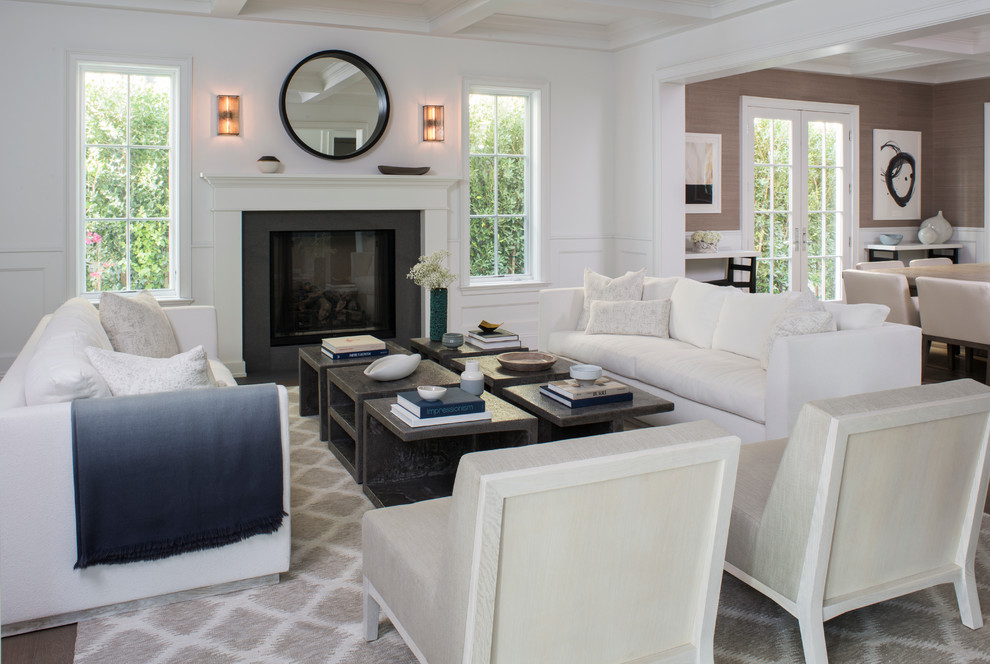 Mid-sized transitional formal open concept living room in Los Angeles with white walls, a standard fireplace and a stone fireplace surround.