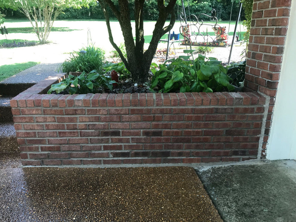 Brick Retaining Wall Restoration from Previous Failed Mortar Matching Repairs