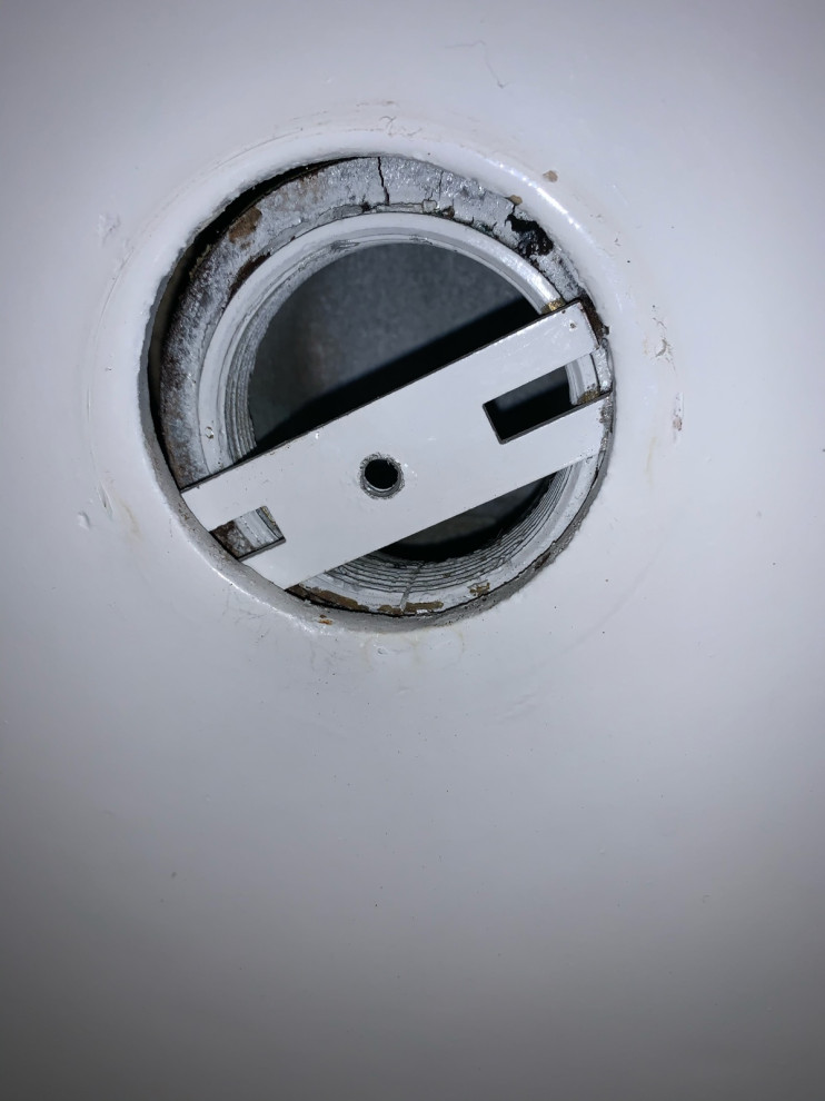 Old bathtub overflow drain - no screw holes