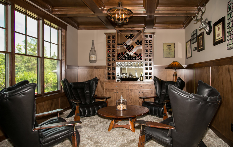 Design ideas for a traditional wine cellar in Minneapolis with carpet and display racks.