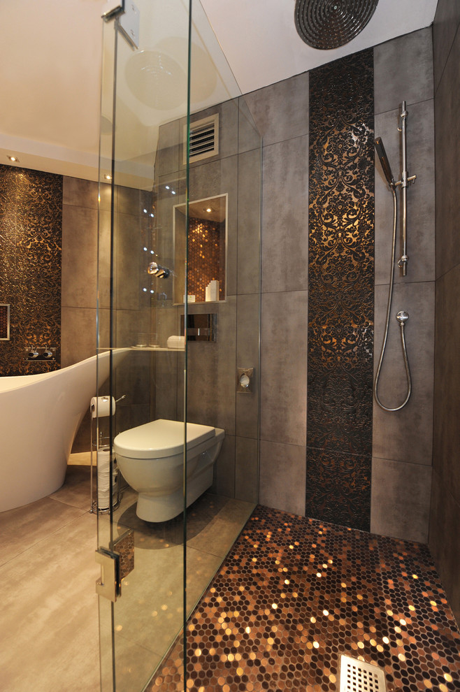 Contemporary bathroom in Belfast with a freestanding tub and mosaic tile.