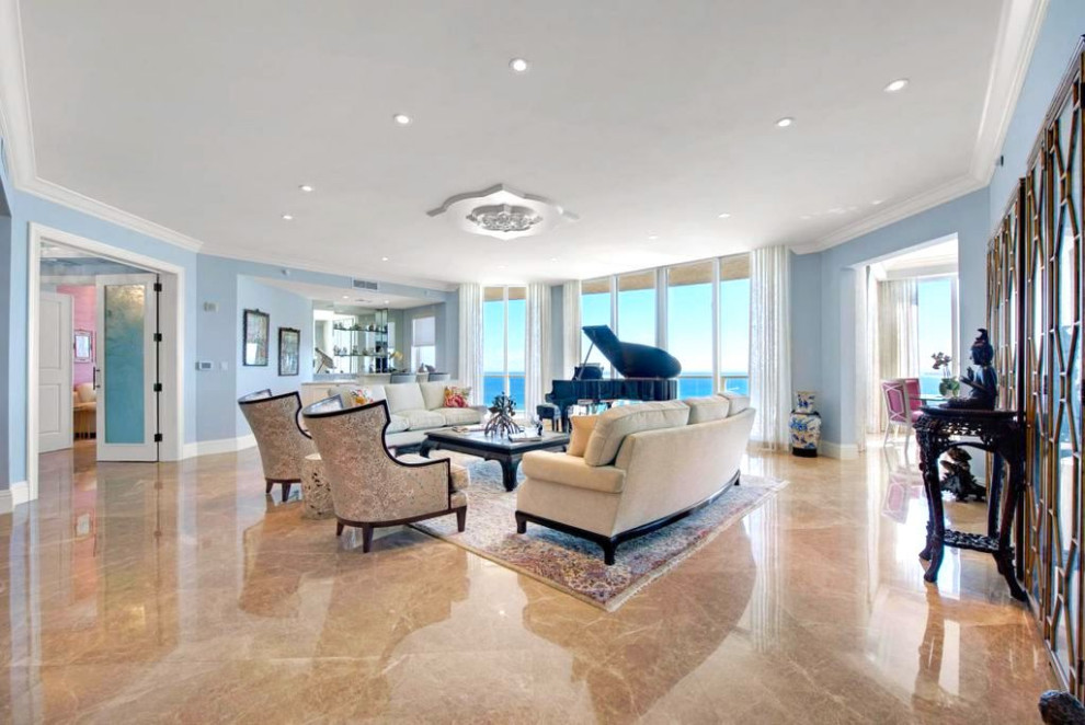 Example of a transitional home design design in Miami