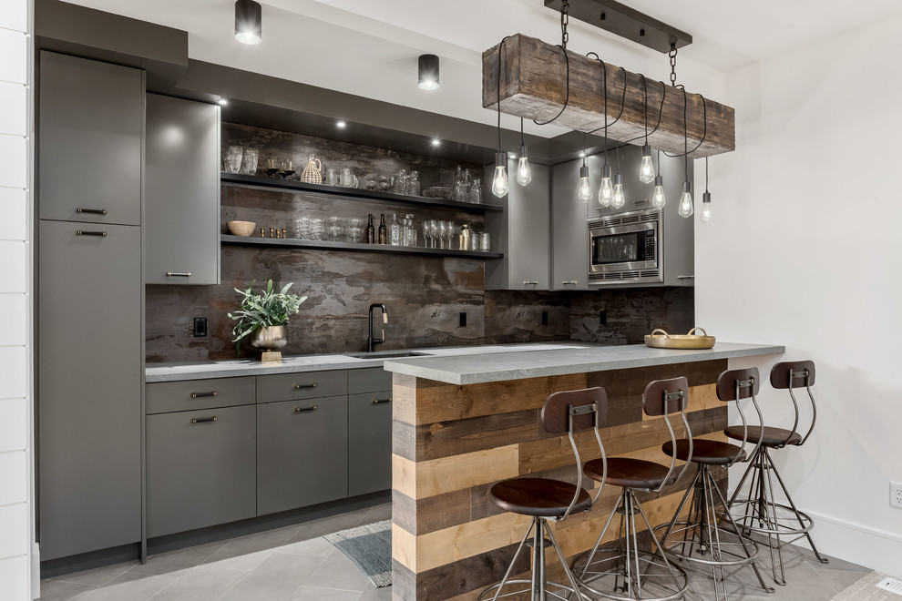 Inspiration for a large contemporary u-shaped wet bar in Salt Lake City with an undermount sink, flat-panel cabinets, grey cabinets, quartzite benchtops, grey splashback, porcelain floors, grey floor and grey benchtop.