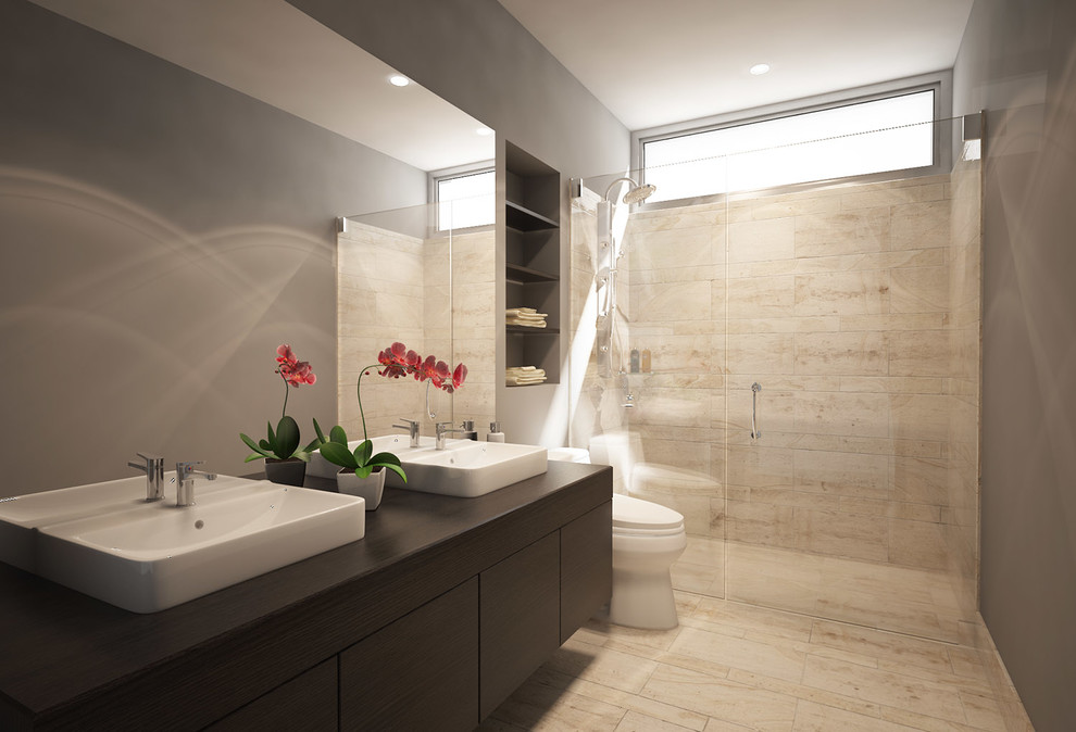 Photo of a small modern 3/4 bathroom in San Francisco with a vessel sink, flat-panel cabinets, dark wood cabinets, wood benchtops, a curbless shower, a one-piece toilet, beige tile, stone tile, brown walls and brown benchtops.