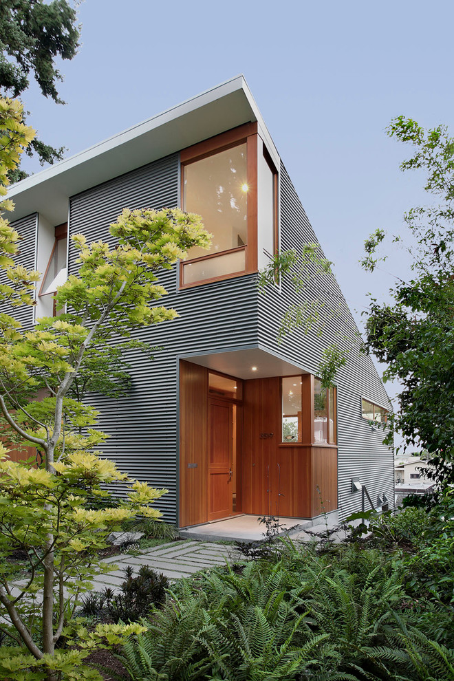 Inspiration for a contemporary exterior in Seattle with metal siding.