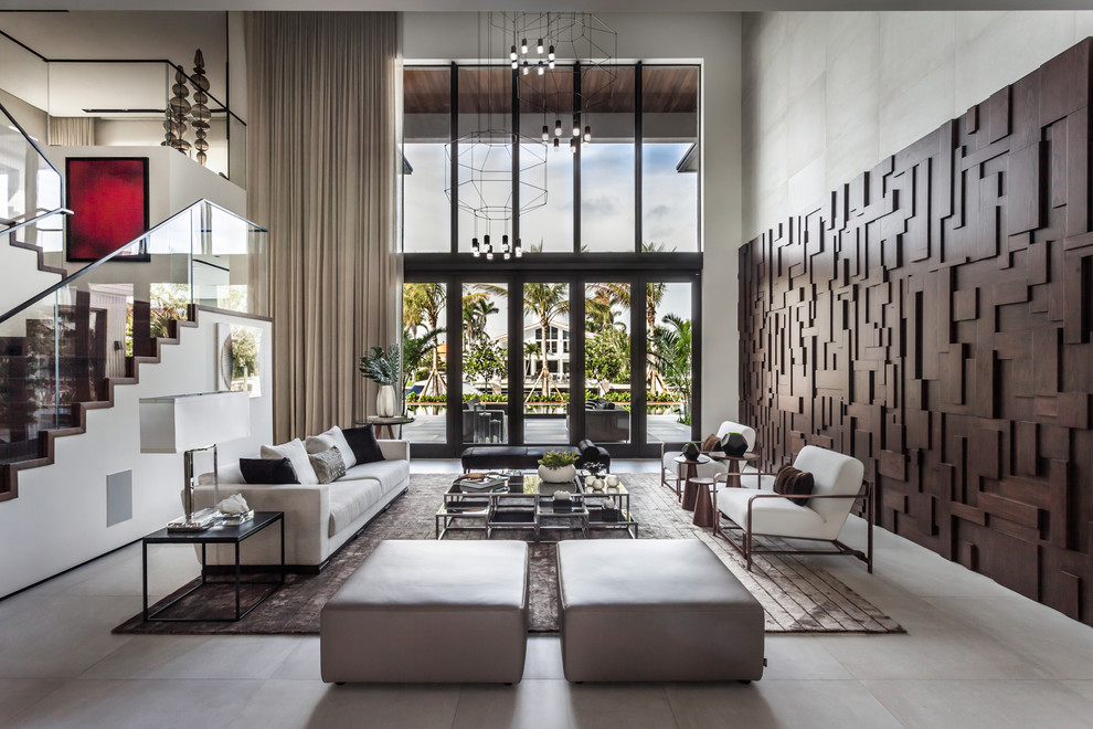 This is an example of a contemporary living room in Miami with grey floor.