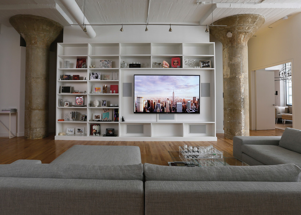 Inspiration for a contemporary living room in New York with a wall-mounted tv.